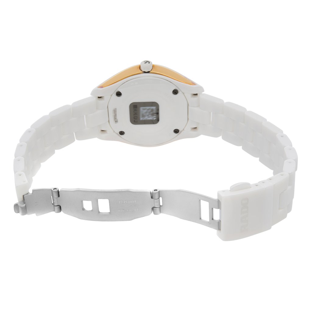 An image of a wristwatch from the back view, showcasing the open clasp. The watch is positioned centrally, with the camera angle focused directly on the back of the watch, capturing its display model condition. The clasp is fully extended, revealing the intricate design of the bracelet links. The watch case and bracelet are prominently displayed at a close distance, highlighting the details of the clasp mechanism and the case back.