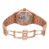An image of a pre-owned men's Audemars Piguet wristwatch displayed from the back view with an open clasp. The watch features a rose gold octagonal case and band, with an exhibition caseback visible. The double-locking fold-over clasp is open, showcasing the intricate links of the band. The condition appears good, and the watch includes luminous hands. The angle is slightly elevated, offering a clear view of the watch’s back and clasp, with a medium distance to capture the details.