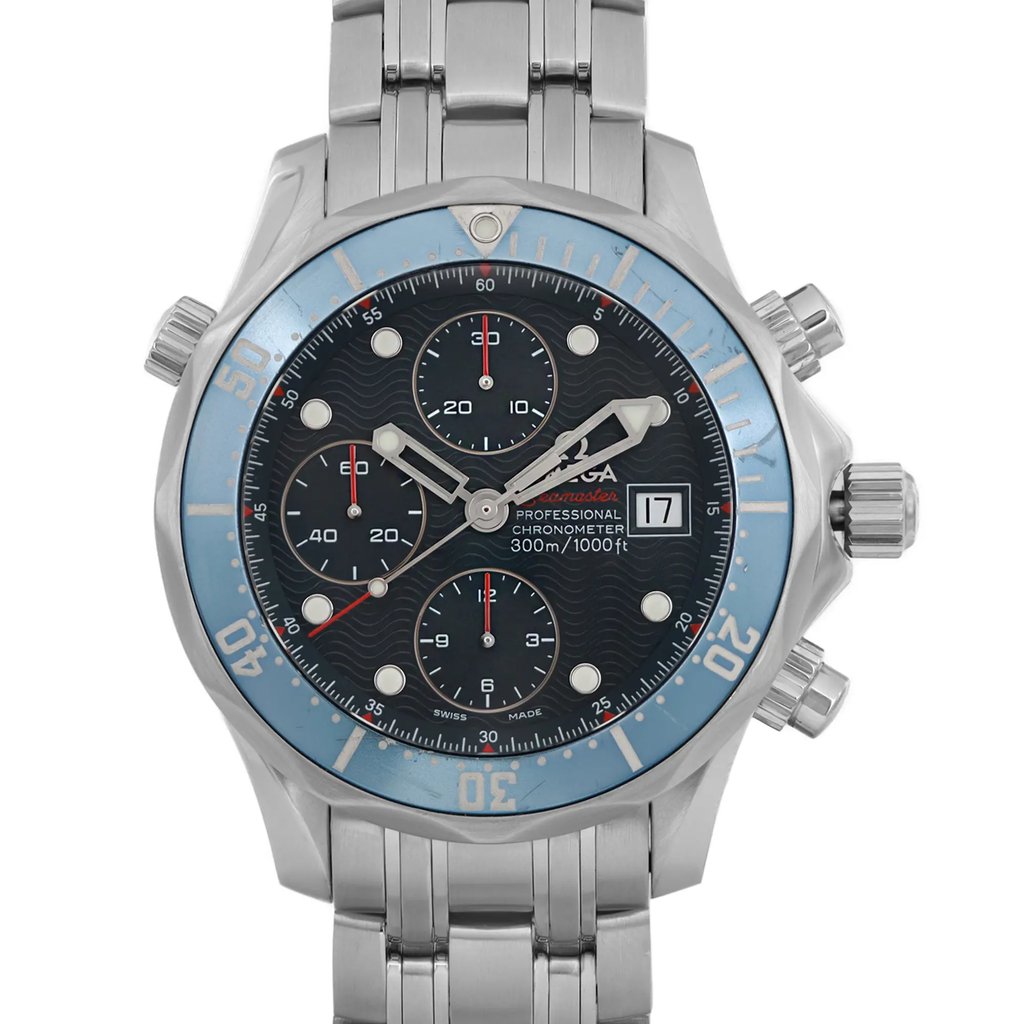 An image of a pre-owned wristwatch captured from a front close-up angle highlighting the watch face. The watch features a stainless steel bracelet and a detailed dial with multiple sub-dials and a date display. The bezel is marked with numbers for easy reading. The overall condition appears well-maintained.