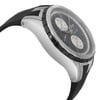 An image of an unworn Edox men's wristwatch in a dress/formal style, viewed from a side profile opposite the crown. The watch features a round stainless steel case with a gray bezel and a black rubber band. It has a black dial equipped with chronograph functions, day/date display, luminous hands, and a small seconds subdial. The watch is positioned at an angle that highlights its side profile, showing the curvature of the case and band, with a medium distance perspective emphasizing its design details.