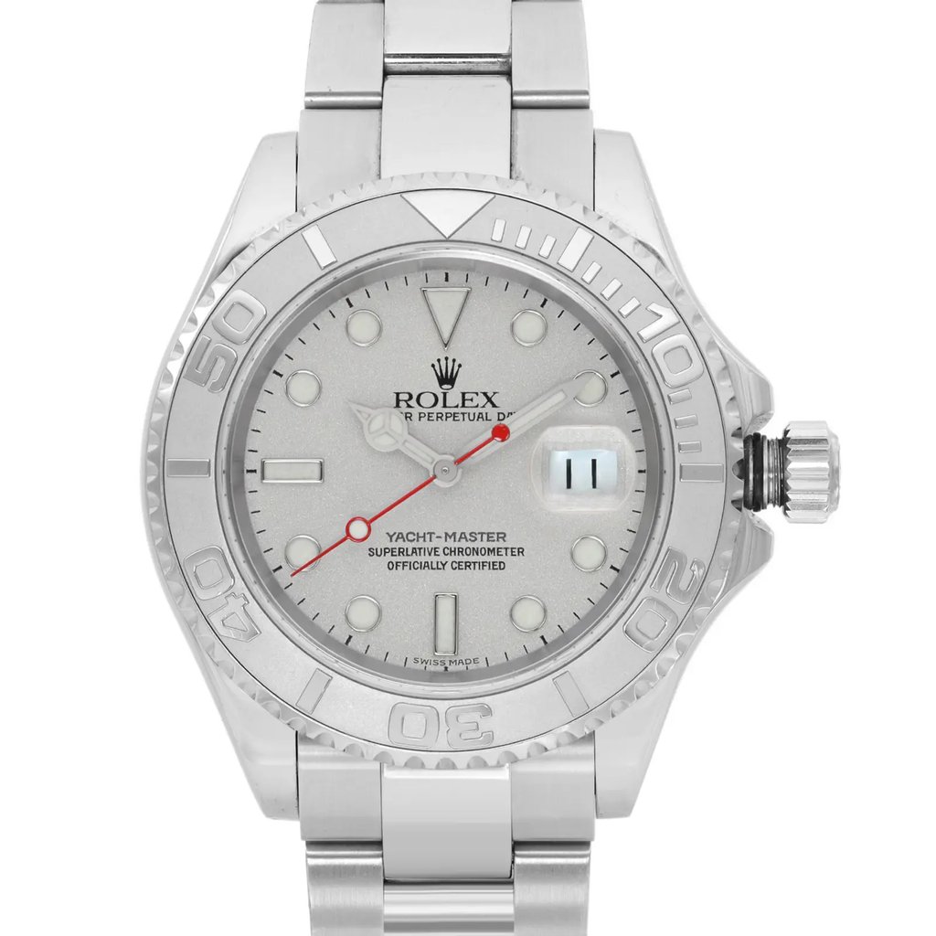 An image of a pre-owned wristwatch taken from a front close-up angle, showcasing the watch face. The watch features a metallic band and a detailed dial with visible markings and a date window. The brand name is not specified.