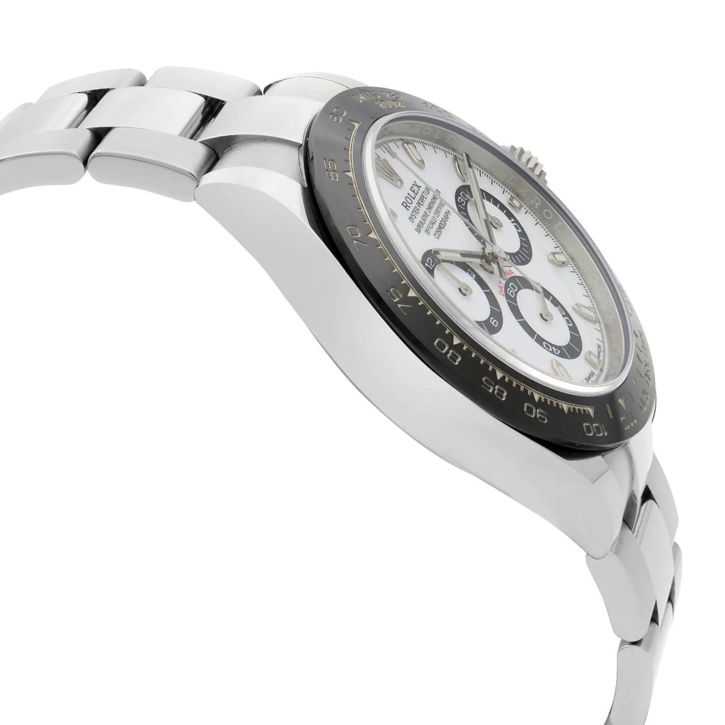An image of a pre-owned men's Rolex sport wristwatch in excellent condition, shown from a side profile view opposite the crown. The watch features a round shape with a white dial and black bezel. It has a stainless steel band and case. The timepiece includes chronograph features, and the image captures the watch at a close angle, highlighting the sleek and polished design details.