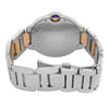 An image of a pre-owned Cartier men's wristwatch with a back view showing the closed clasp. The watch is positioned with the clasp facing toward the camera, at a straight-on angle, occupying the central portion of the frame at a close distance. The caseback, made of stainless steel, features engraving that includes the brand name and other details. The watch band is a combination of stainless steel and 18k rose gold, highlighting a two-tone appearance. It is equipped with a fold-over clasp with double push button for secure closure. 