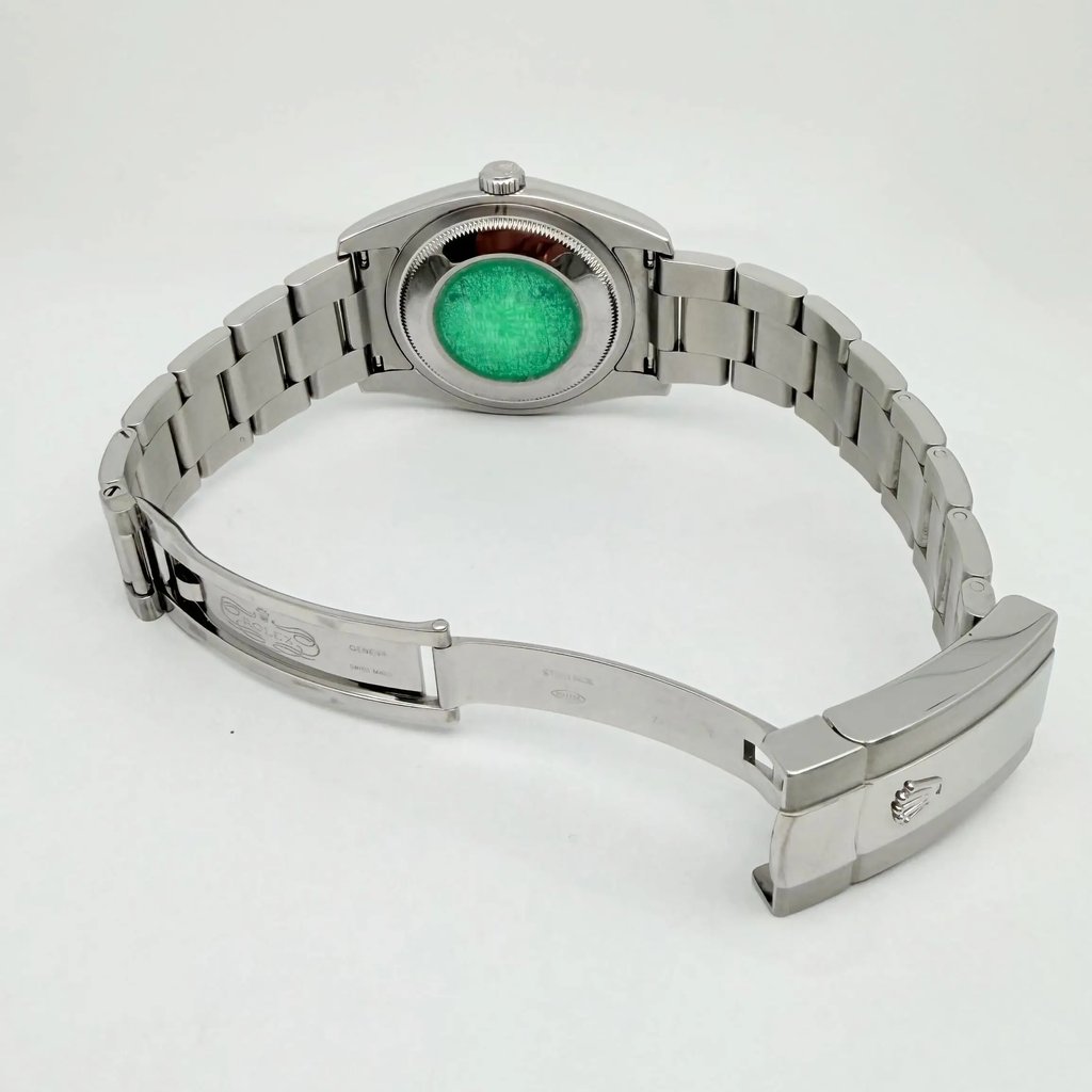 Back View Of Solid Back Case And Open Stainless Steel Band Of Rolex 116234 Watch Pre Owned Condition