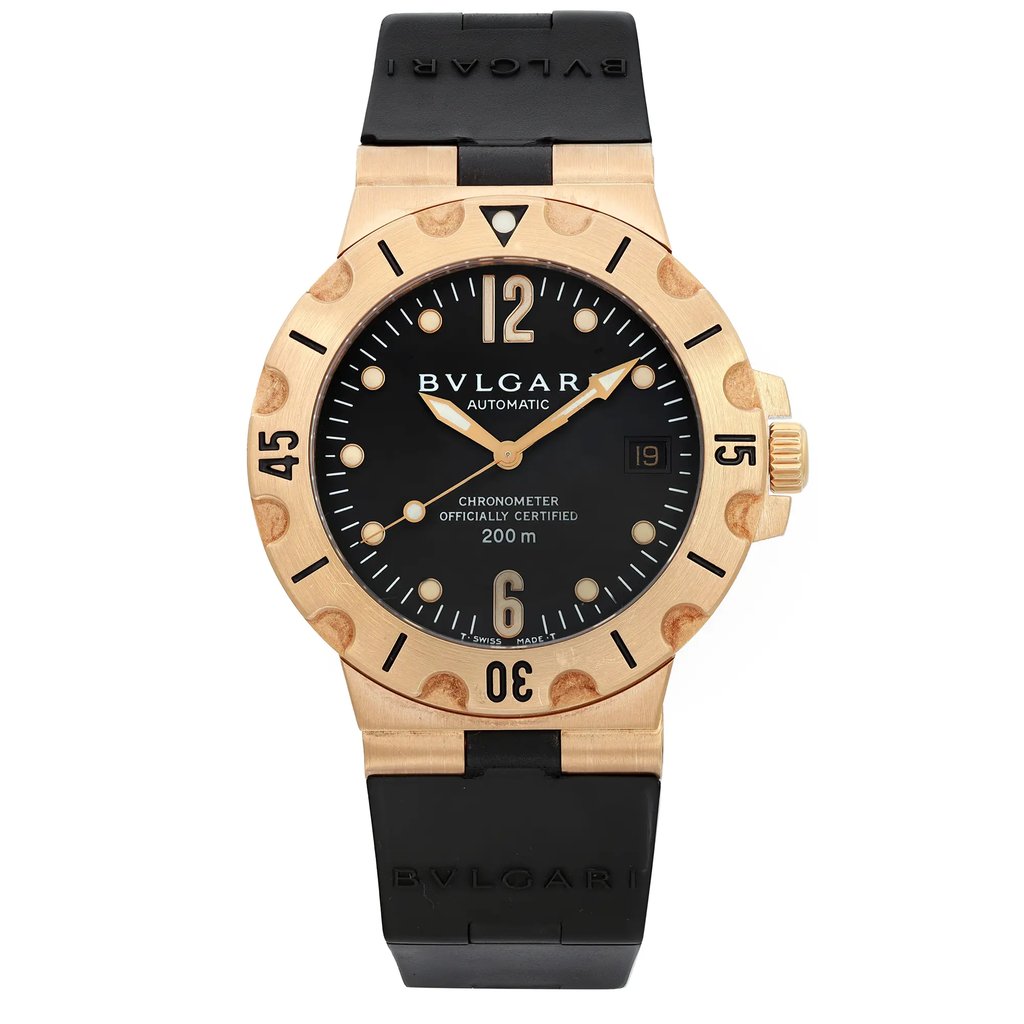 An image of a pre-owned Bvlgari men's wristwatch, captured in a full frontal view. The luxury timepiece has a round shape with a black dial and gold bezel. It features a yellow gold case and black rubber band, with visible signs of wear on the band and light scratches on the watch. The watch has a 12-hour dial with round indexes and is positioned centrally at a close distance, ensuring the entire watch is visible.