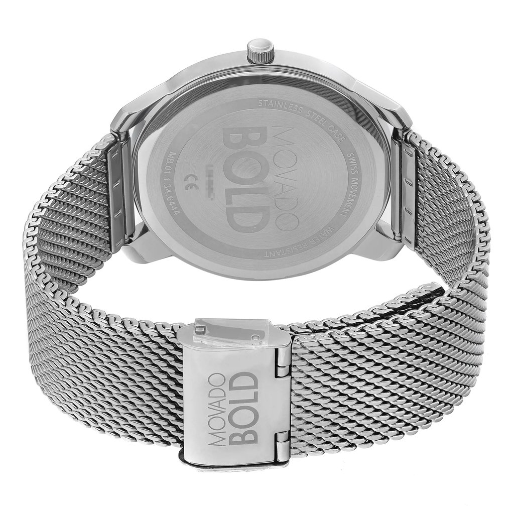 An image of a wristwatch taken from the back view, showcasing the closed clasp. The watch features a stainless steel mesh band and displays the brand name "Movado Bold" on both the clasp and the back of the watch case. The angle is slightly elevated, capturing the watch from a close distance, highlighting its sleek and polished design. The condition is noted as a display model.