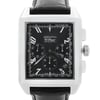 An image of a pre-owned wristwatch taken from a front close-up angle, focusing on the watch face. The watch has a rectangular dial with multiple sub-dials and a tachymeter scale around the edge. The casing appears to be metallic, and the strap is black leather. The brand name is visible on the dial.