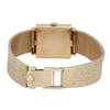 An image of a pre-owned Patek Philippe unisex wristwatch, viewed from the back. The watch is centrally positioned and captured from a straight angle at a close distance. It features a yellow gold metal bracelet with a textured pattern and a square case. The clasp is visible in the foreground, showcasing its secure fastening mechanism.