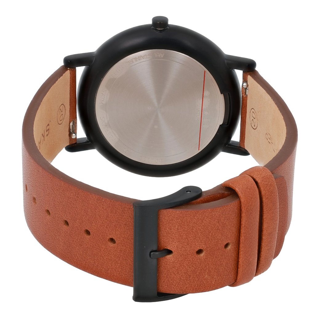 An image of a Skagen men's wristwatch taken from a rear angle, displaying the back of the watch case and the brown leather strap. The watch is positioned upright, showing its circular stainless steel back, and the image captures it from a close distance, highlighting the strap's texture and buckle detail.