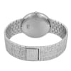 An image of a pre-owned Piaget unisex adult wristwatch taken from a slightly elevated angle, showcasing the back of the watch. The focus is on the closed stainless steel bracelet, which displays a textured pattern. The watch's round case and crown are visible, with the clasp engraved with a subtle "P" logo. The angle offers a clear view of the watch's back, highlighting its craftsmanship.