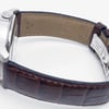 Back View Of Exhibition Back Case And Closed Leather Band Of Tissot T065.430.16.031.00 Watch Pre Owned Condition