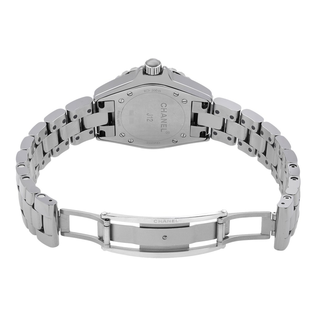 An image of a pre-owned wristwatch viewed from the back, showing an open clasp. The watch is positioned horizontally with the clasp fully extended, revealing the brand details on the back of the watch case. The photograph is taken from a straight-on angle at a moderate distance, highlighting the metallic links and fastening mechanism.