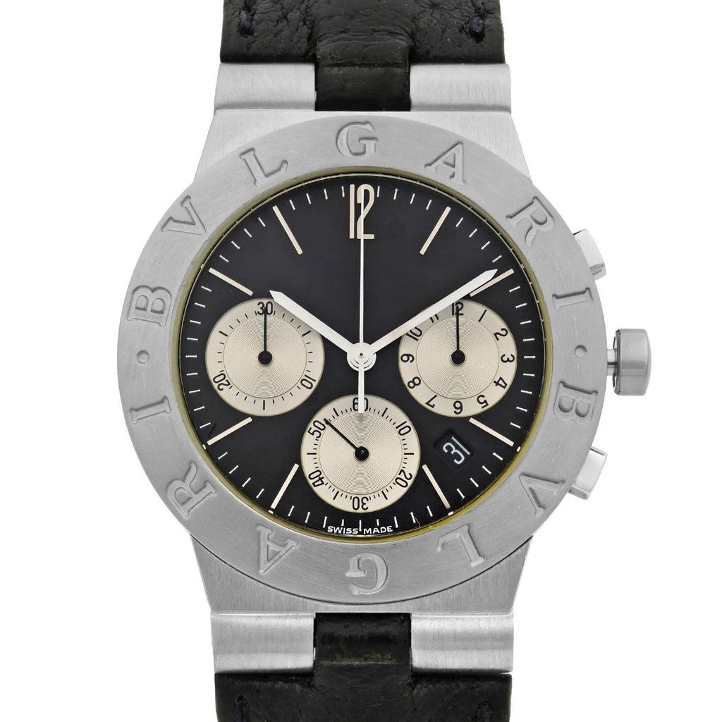 An image of a pre-owned wristwatch captured from the front close-up angle. The watch features a black face with three subdials and silver-tone hands. The bezel prominently displays the brand name "BVLGARI." The case is metallic with a textured black leather strap visible at the top. The timepiece is viewed directly from the front, focusing on the intricate details of the watch face.