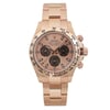 An image of a pre-owned men's luxury Rolex wristwatch, shown from a front full frontal view. The watch features a sundust dial with 12-hour indices and a rose gold bezel. The band and case are also made of rose gold, giving it a cohesive and elegant appearance. The round-shaped watch is in good condition and includes features such as a chronograph and luminous hands.