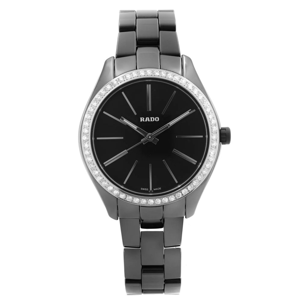 An image of a Wristwatch by Rado. This Display Model item is designed for Women, featuring a Dress/Formal,Luxury style. It has a Quartz movement and an Analog display with a Black dial color. The indices include 12-Hour Dial,Non-Numeric Hour Marks. The band is made of Ceramic and the case is made of Ceramic,Stainless Steel. The watch has a Round shape with a case size of 36 mm and a case thickness of 11 mm.