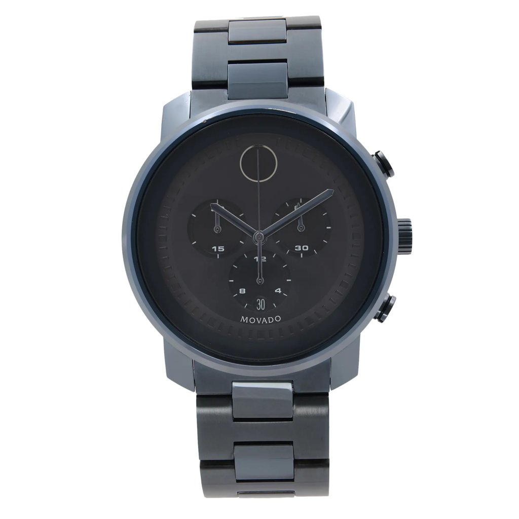 An image of a pre-owned wristwatch taken from a front full frontal view. The watch features a dark dial with three subdials and minimalist hour markers. The case and bracelet are metallic, reflecting a sleek design. The image is captured at a close distance, highlighting the watch's details and craftsmanship.