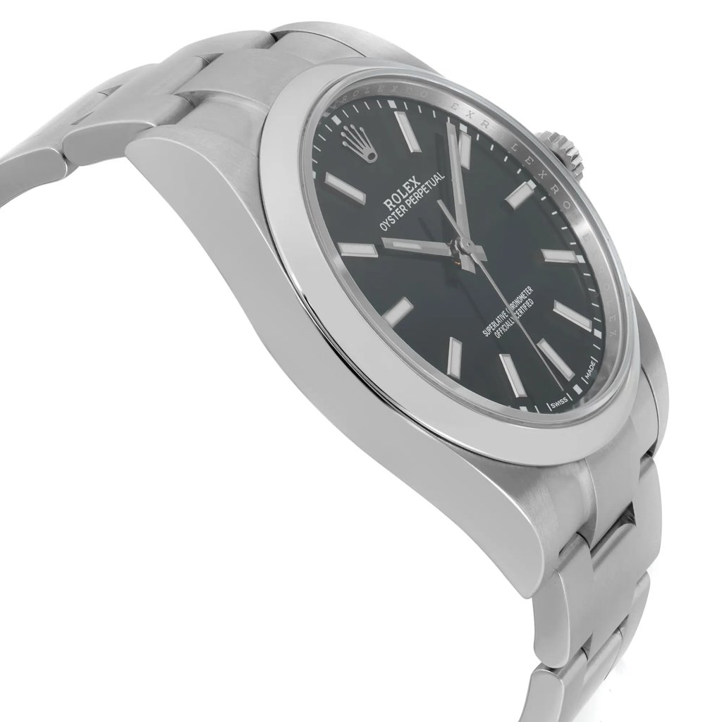 An image of a pre-owned men's Rolex wristwatch in good condition, viewed from the side profile opposite the crown. The watch features a round shape with a black dial and gray bezel. Crafted from stainless steel, both the band and case exude a sleek, casual style. The angle highlights the watch's polished finish and elegant design.