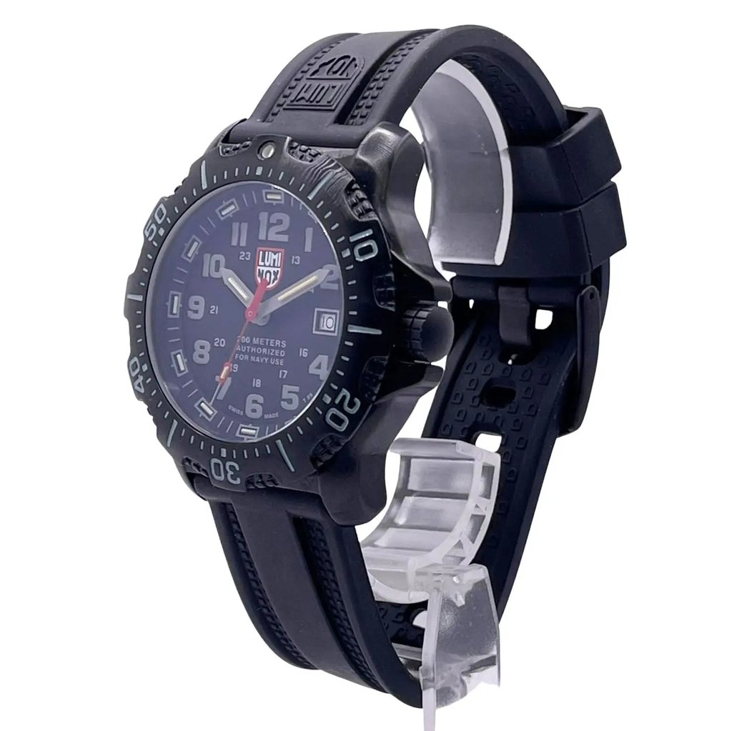 An image of a Wristwatch by Luminox. This Pre Owned item is designed for Men, featuring a Casual,Classic,Diver,Military style. It has a Quartz movement and an Analog display with a Black dial color. The indices include 12-Hour Dial,24-Hour Dial,Arabic Numerals. The band is made of Rubber and the case is made of Stainless Steel. The watch has a Round shape with a case size of 45 mm and a case thickness of 13 mm.