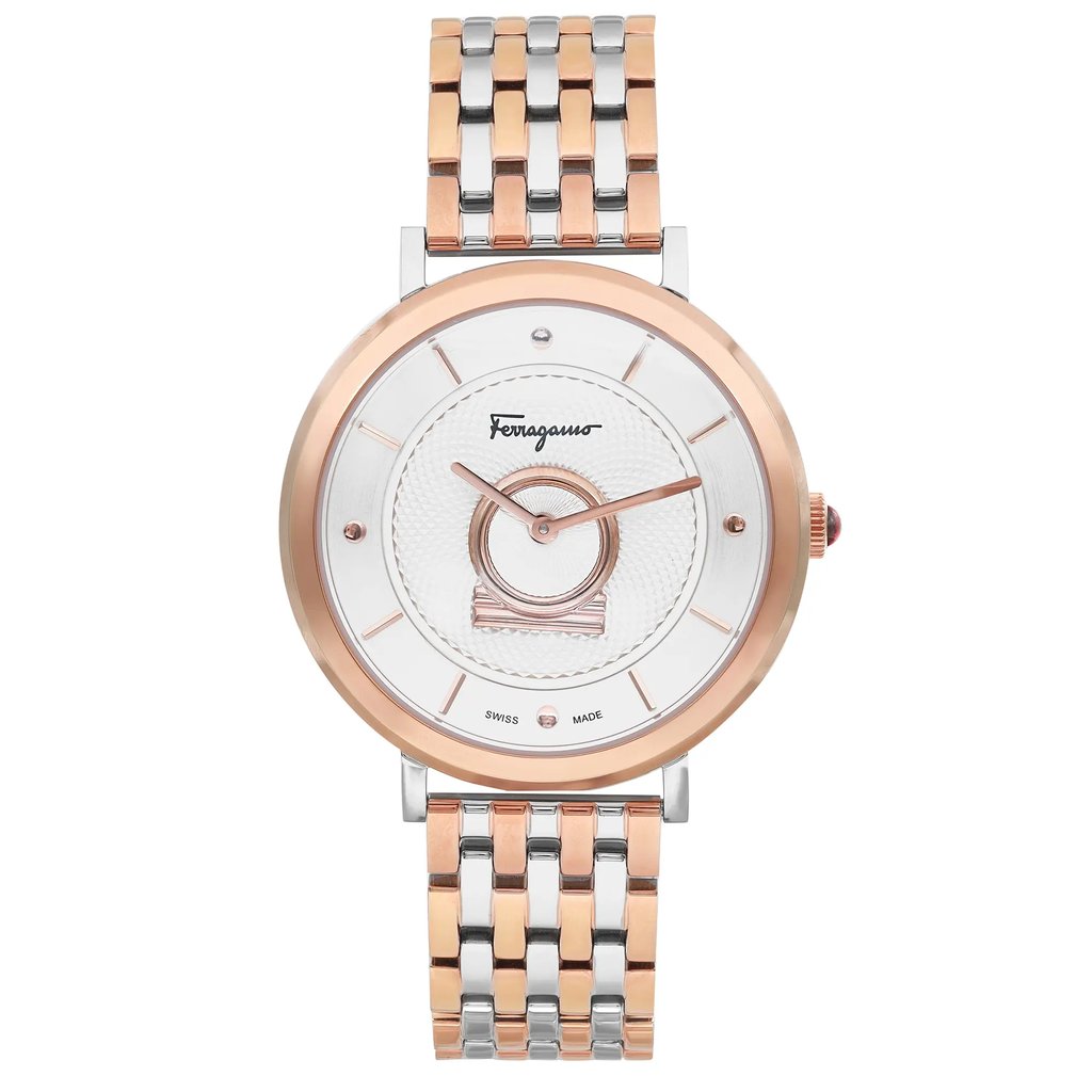 An image of a Wristwatch by Ferragamo. This Unworn item is designed for Women, featuring a Casual style. It has a Quartz movement and an Analog display with a Silver dial color. The indices include 12-Hour Dial,Stick Indexes. The band is made of Stainless Steel and the case is made of Stainless Steel. The watch has a Round shape with a case size of 36 mm and a case thickness of 10 mm.