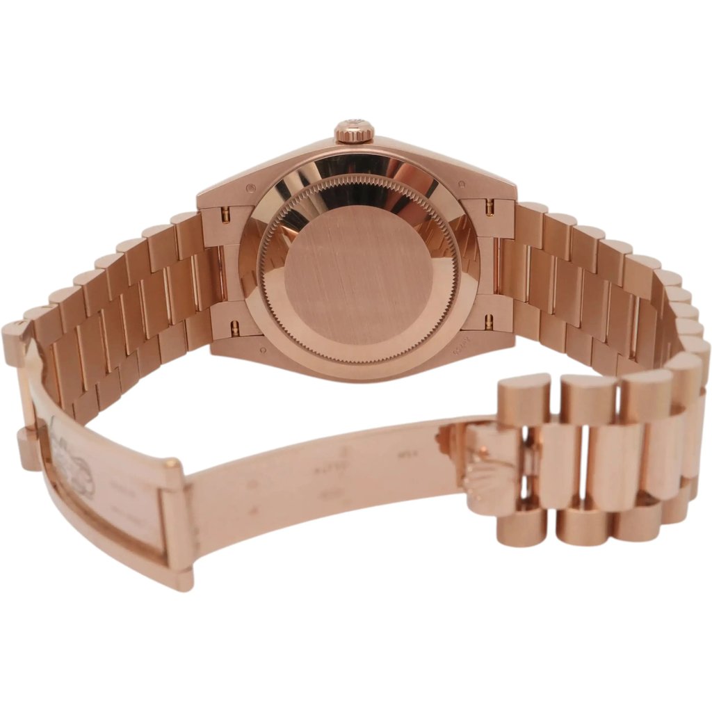 Back View Of Solid Back Case And Open Rose Gold Band Of Rolex 228235 Watch Pre Owned Condition