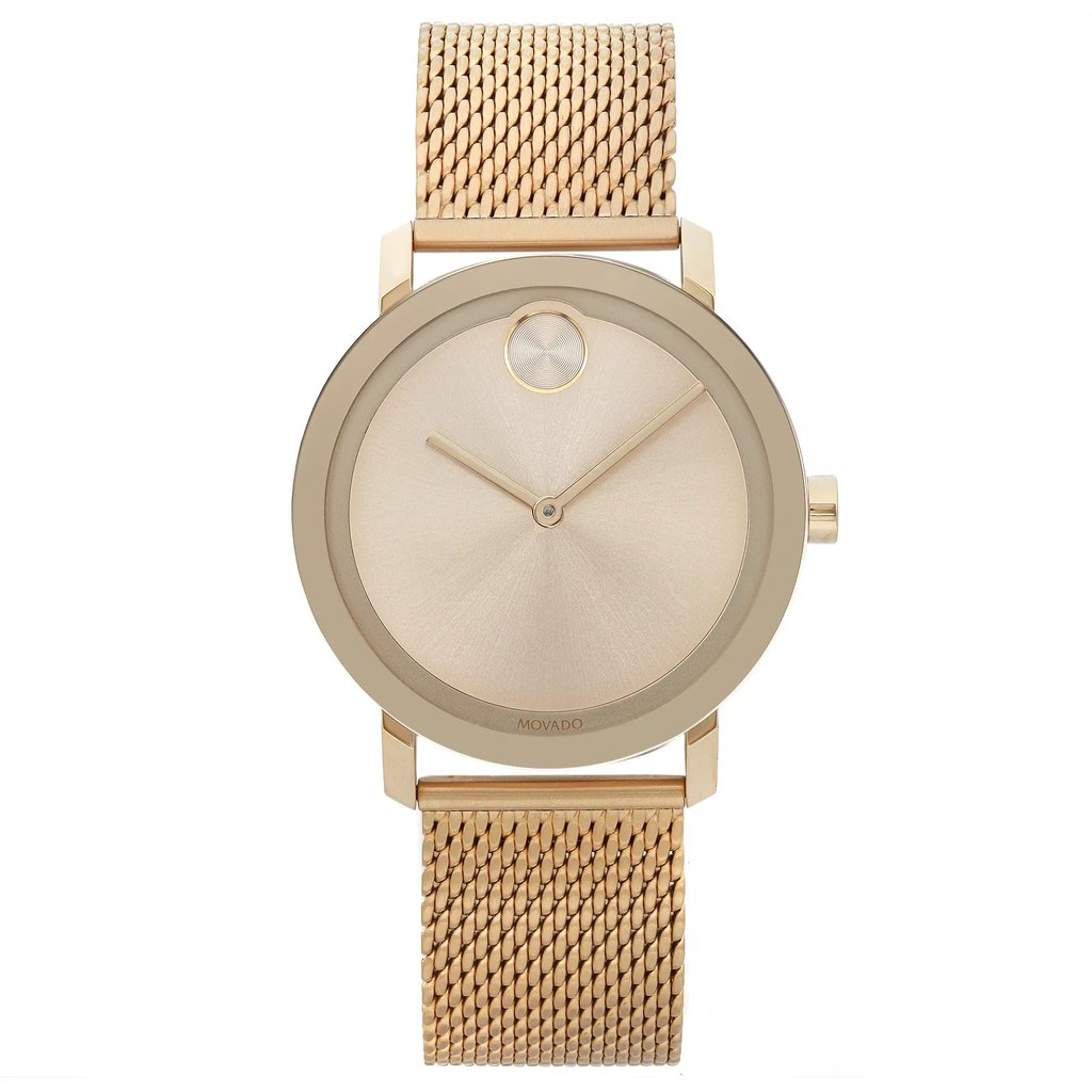 An image of a pre-owned wristwatch shown from a front full frontal view. The watch features a sleek, gold-toned mesh band and a minimalist dial with simple hour and minute hands. The photo captures the watch directly, emphasizing its elegant design and metallic finish.