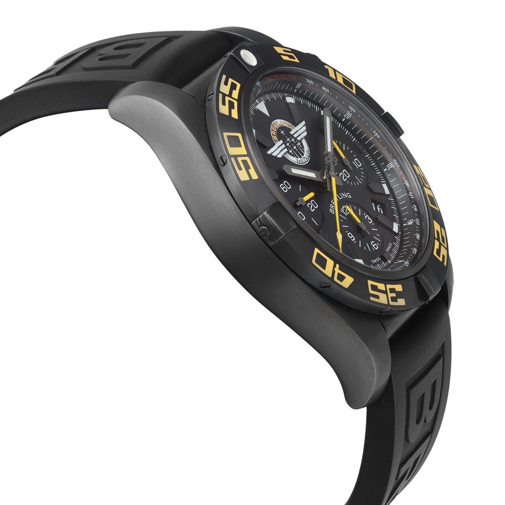 An image of a pre-owned Breitling men's wristwatch in a pilot/aviator style, presented in a side profile view opposite of the crown. The watch features a black dial and bezel, with yellow accents and numerals. It is fitted with a black rubber band and the case material is black stainless steel. The round shape of the watch is visible from this angle, showcasing its sleek design. The watch is positioned at a close distance, offering a clear view of its side profile.