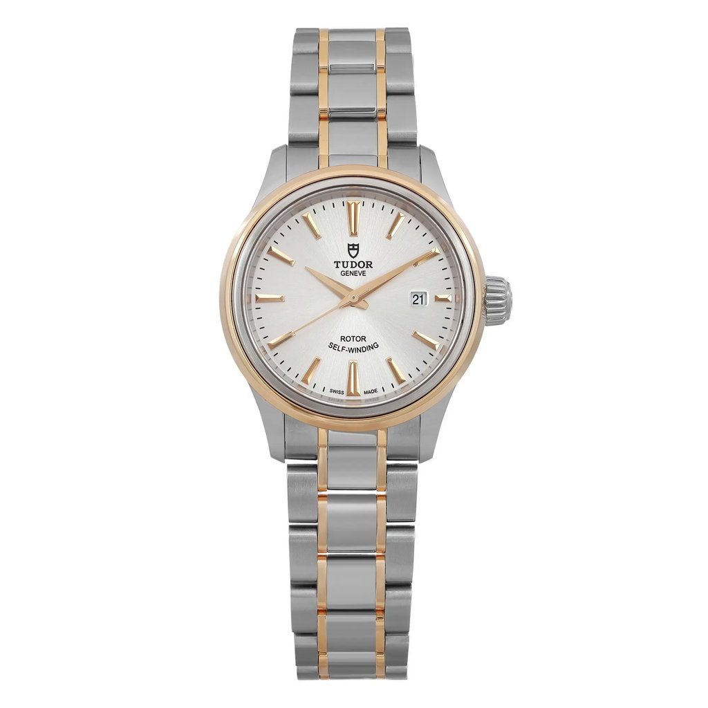 An image of a Tudor Style 28 ladies wristwatch, displayed from a straight-on angle at a close distance. The watch features a stell and yellow gold bracelet, a silver dial, and a date indicator positioned at 3 o'clock. The bezel and hour markers are gold, complementing the overall design. The watch is in an unworn condition.