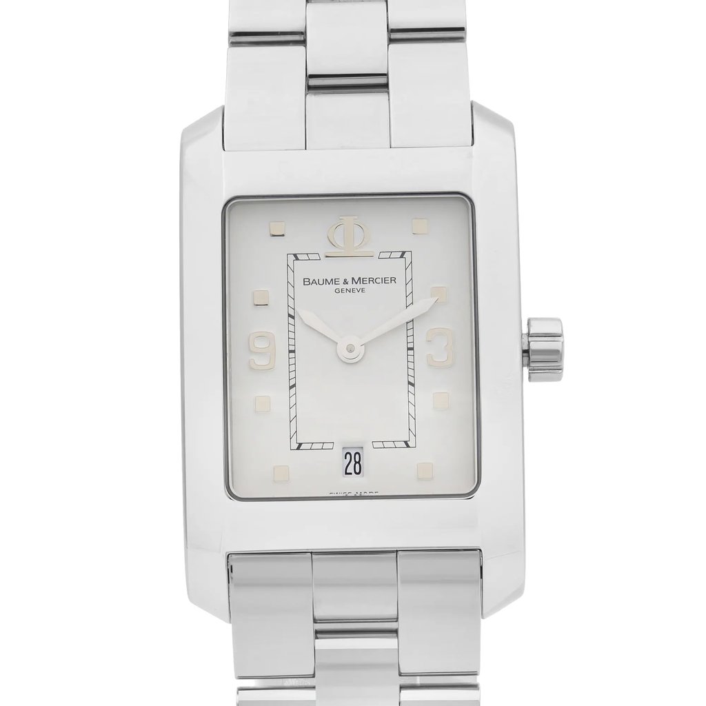 An image of a wristwatch taken from a full frontal view. The watch is positioned centrally, showcasing its rectangular face and metallic band. The angle is straight-on, emphasizing the design and details of the watch face, including numerals and hands. The distance is close, allowing for clear visibility of the display model's features.