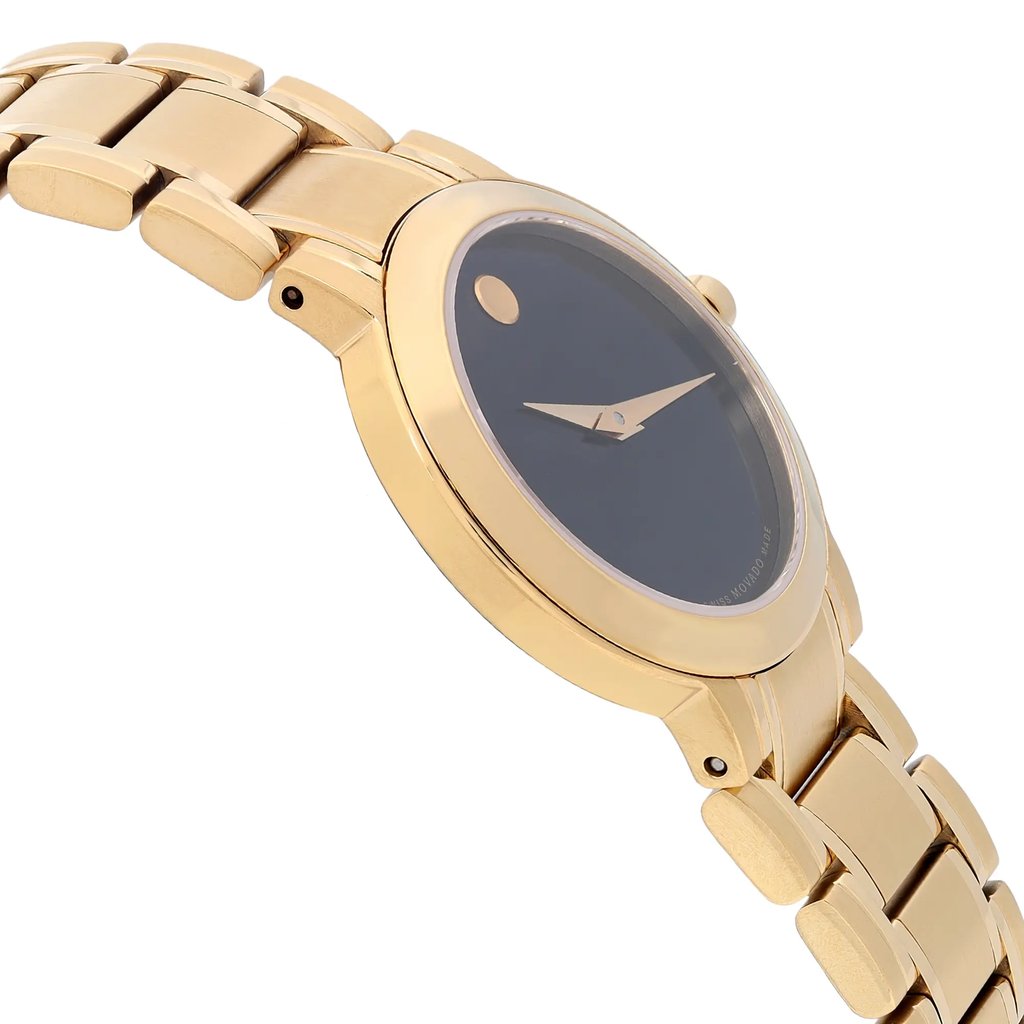 An image of a wristwatch viewed from the side profile, opposite the crown. The watch features a gold-toned metal bracelet and case. The angle showcases the sleek design and unworn condition of the timepiece, with the focus on the bracelet links and the edge of the watch face. The background is plain, emphasizing the watch's elegant appearance.