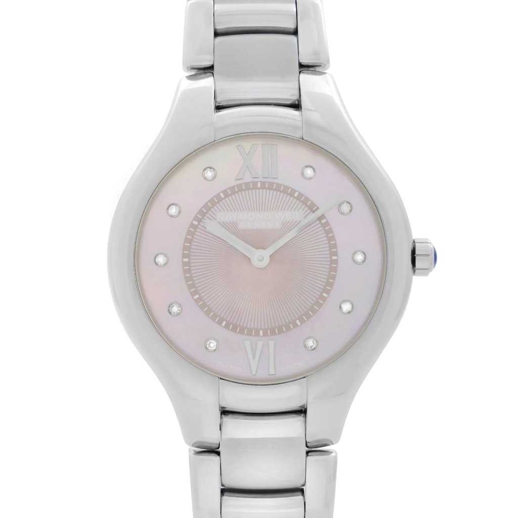 An image of an unworn RAYMOND WEIL women's wristwatch with a casual and dress/formal style. The photo provides a front close-up shot of the watch face, showing a pink mother of pearl dial, accented by Roman numerals at the 12 and 6 o'clock positions and diamonds at the other hour marks. The round case and band are made of stainless steel, reflecting light evenly due to their polished surfaces.