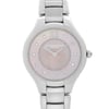 An image of an unworn RAYMOND WEIL women's wristwatch with a casual and dress/formal style. The photo provides a front close-up shot of the watch face, showing a pink mother of pearl dial, accented by Roman numerals at the 12 and 6 o'clock positions and diamonds at the other hour marks. The round case and band are made of stainless steel, reflecting light evenly due to their polished surfaces.