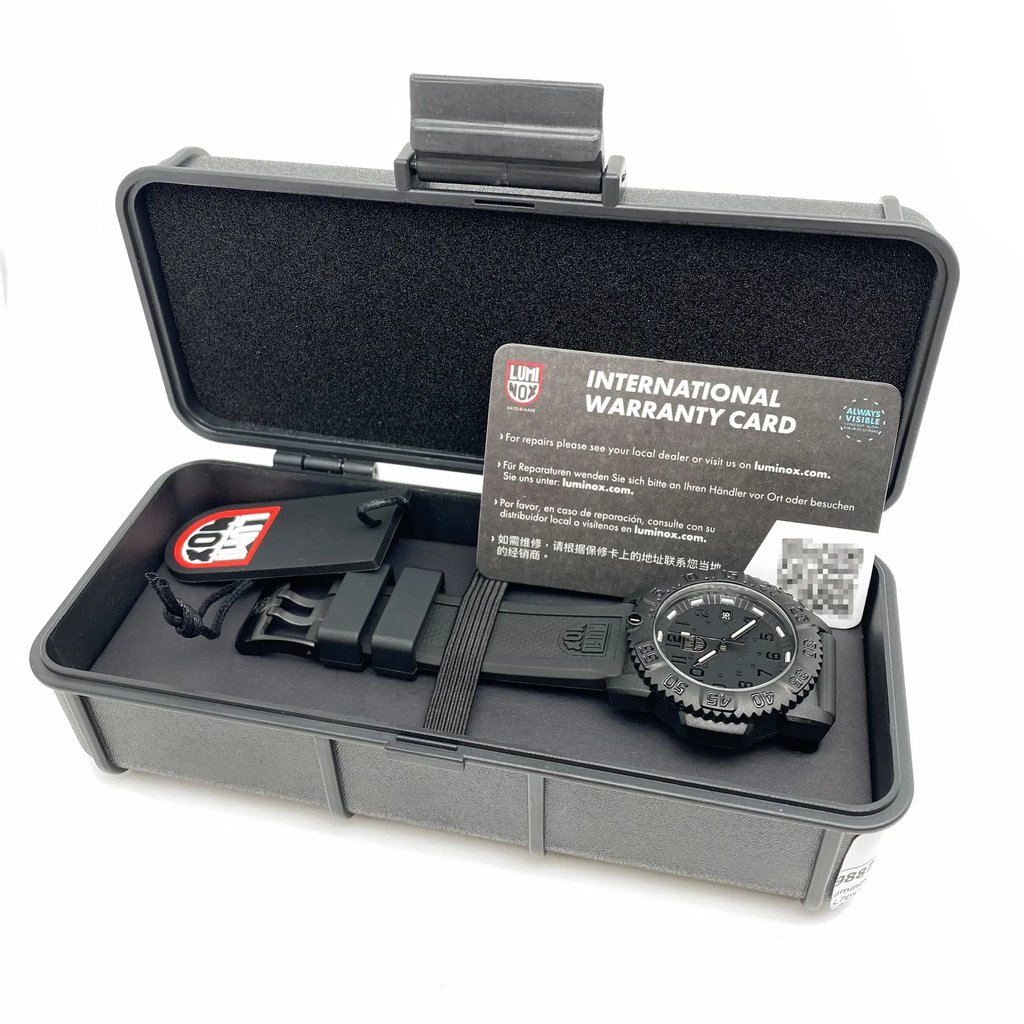An image of a Wristwatch by Luminox. This New item is designed for Unisex Adult, featuring a Casual,Diver style. It has a Quartz movement and an Analog display with a Black dial color. The indices include 12-Hour Dial,24-Hour Dial,Arabic Numerals. The band is made of Rubber and the case is made of Carbon. The watch has a Round shape with a case size of 38 mm and a case thickness of 12 mm.