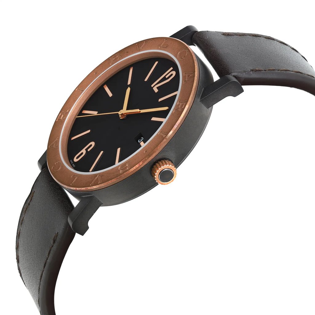 An image of a new Bvlgari men's wristwatch in a casual style, viewed from the side showing the crown. The watch has a round stainless steel case with a bronze bezel, a black dial, and gold-toned hands, positioned at a close-up angle. The dark brown leather band curves away from the watch face, highlighting the unworn condition of the watch.