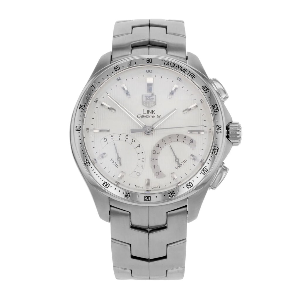 An image of a Wristwatch by TAG Heuer. This Pre Owned item is designed for Men, featuring a Sport style. It has a Quartz movement and an Analog display with a Silver dial color. The indices include Sticks. The band is made of Stainless Steel and the case is made of Stainless Steel. The watch has a Round shape with a case size of 43 mm and a case thickness of 13 mm.