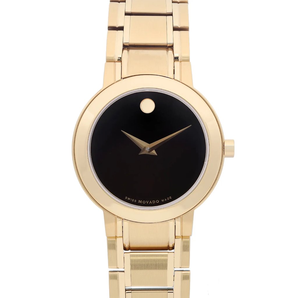 An image of a wristwatch captured from the front in a close-up shot. The watch features a gold-tone case and bracelet with a sleek black dial. The design is minimalistic, highlighting gold hands and a single gold dot at the 12 o'clock position. The watch appears unworn and is photographed against a white background.