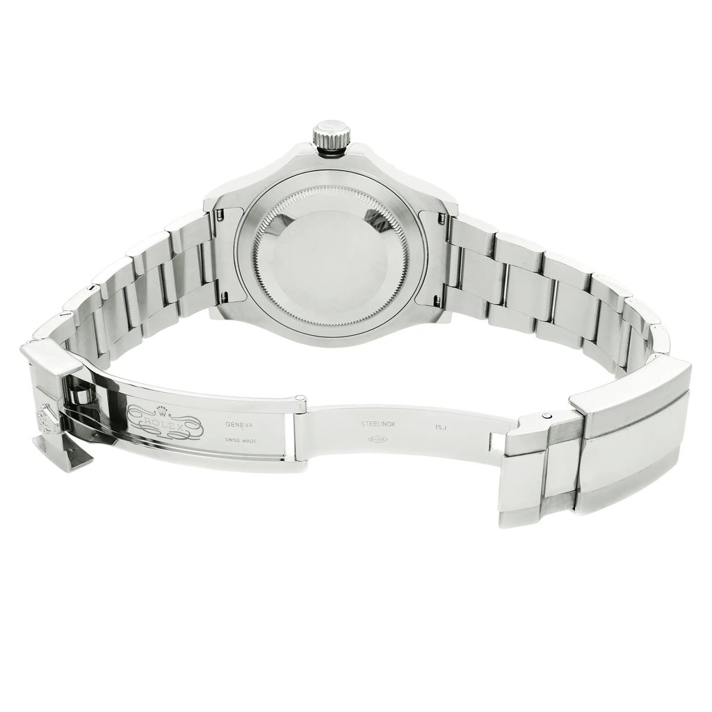 An image of a pre-owned wristwatch showing the back view with the clasp open. The watch is positioned at eye level, capturing a straight-on angle. The focus is on the stainless steel bracelet and the back case, emphasizing the intricate details and markings. The image is taken from a medium distance, highlighting the craftsmanship of the watch.