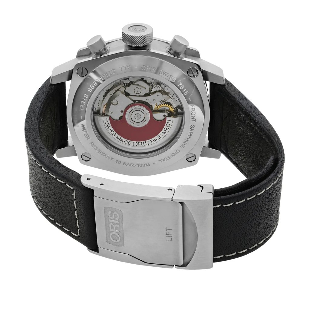 An image of a Wristwatch by Oris. This Pre Owned item is designed for Men, featuring a Casual,Dress/Formal style. It has a Mechanical (Automatic) movement and an Analog display with a Black dial color. The indices include 12-Hour Dial,Multi Dial,Non-Numeric Hour Marks,Stick Indexes. The band is made of Leather and the case is made of Stainless Steel. The watch has a Round shape with a case size of 43 mm and a case thickness of 16 mm.
