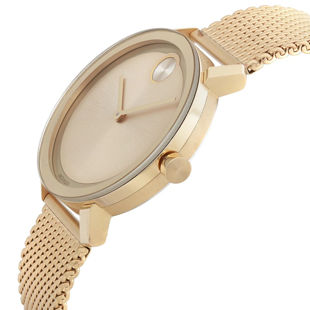 An image of a Wristwatch by Movado. This Pre Owned item is designed for Men, featuring a Casual style. It has a Quartz movement and an Analog display with a Gold dial color. The indices include 12-Hour Dial,No Hour Marks. The band is made of Stainless Steel and the case is made of Stainless Steel. The watch has a Round shape with a case size of 40 mm and a case thickness of 9 mm.