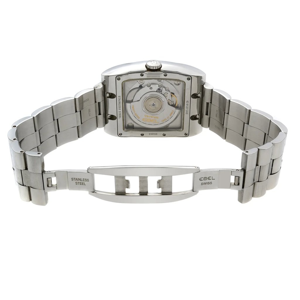 An image of a pre-owned wristwatch shown from the back view. The watch is positioned with an open clasp, displaying the intricate mechanics of the stainless steel timepiece. The angle is direct and centered, capturing the full bracelet and the detailed inner workings of the watch. The distance allows for a clear view of the brand markings and the watch's mechanism.