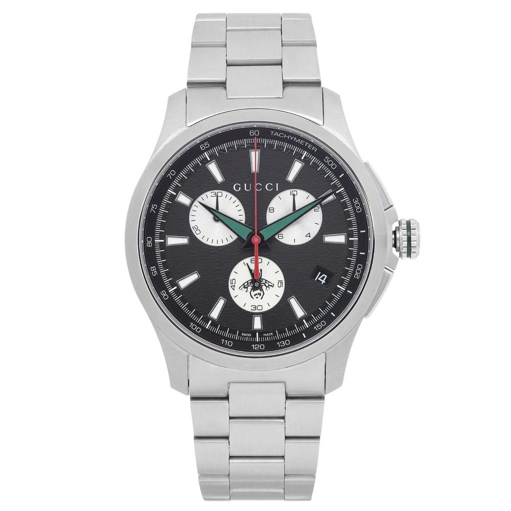 An image of a Wristwatch by Gucci. This Pre Owned item is designed for Men, featuring a Dress/Formal style. It has a Quartz movement and an Analog display with a Black dial color. The indices include 12-Hour Dial,Multi Dial,Non-Numeric Hour Marks,Stick Indexes. The band is made of Stainless Steel and the case is made of Stainless Steel. The watch has a Round shape with a case size of 44 mm and a case thickness of 11 mm.