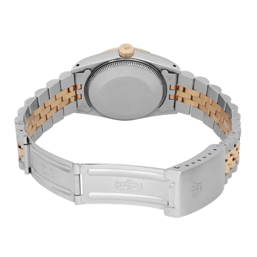 An image of a pre-owned wristwatch shown from the back view with the clasp open. The watch features a silver and gold-tone metal bracelet, and the angle captures the watch lying flat with the case back and the open clasp prominently displayed. The image is taken from a close distance, focusing on the details of the clasp and the watch's back.