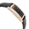 An image of a Wristwatch by Longines. This Display Model item is designed for Women, featuring a Luxury style. It has a Quartz movement and an Analog display with a Black dial color. The indices include 12-Hour Dial,Diamond Markers,Non-Numeric Hour Marks. The band is made of Leather and the case is made of Rose Gold. The watch has a Rectangle shape with a case size of 23 mm and a case thickness of 7 mm.