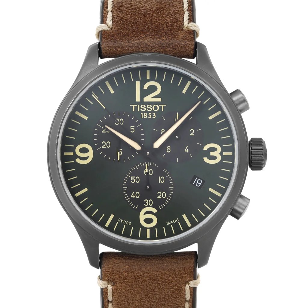 An image of a Wristwatch by Tissot. This Pre Owned item is designed for Men, featuring a Casual style. It has a Quartz movement and an Analog display with a Green dial color. The indices include 12-Hour Dial,Stick Indexes. The band is made of Leather and the case is made of Stainless Steel. The watch has a Round shape with a case size of 45 mm and a case thickness of 11 mm.