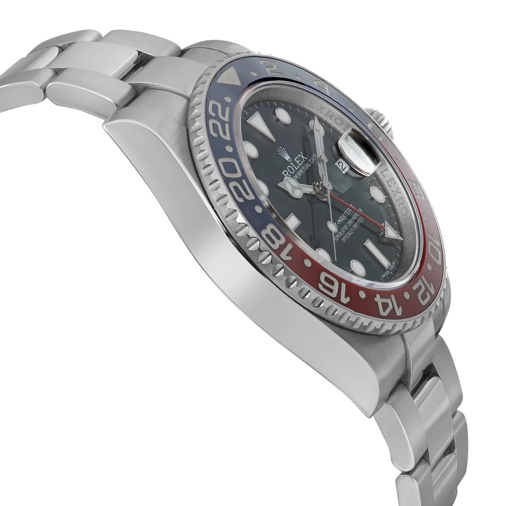 An image of a pre-owned men's Rolex wristwatch in a side profile view opposite the crown, showing a medium distance shot that captures the watch at a slight angle. This luxury watch features a round white gold case and band, a black dial with luminous hands, and a date indicator. The bezel is colored in shades of blue and red, and there may be light scratches indicative of prior use.