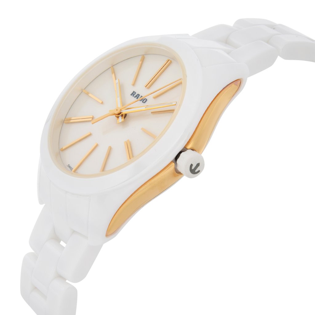 An image of a wristwatch displayed in a side profile view, showcasing the crown prominently. The watch features a white and gold color scheme, with the crown positioned on the right side. The angle highlights the smooth, rounded edges and the bracelet links. The watch is a display model, with the focus on its sleek design and craftsmanship.