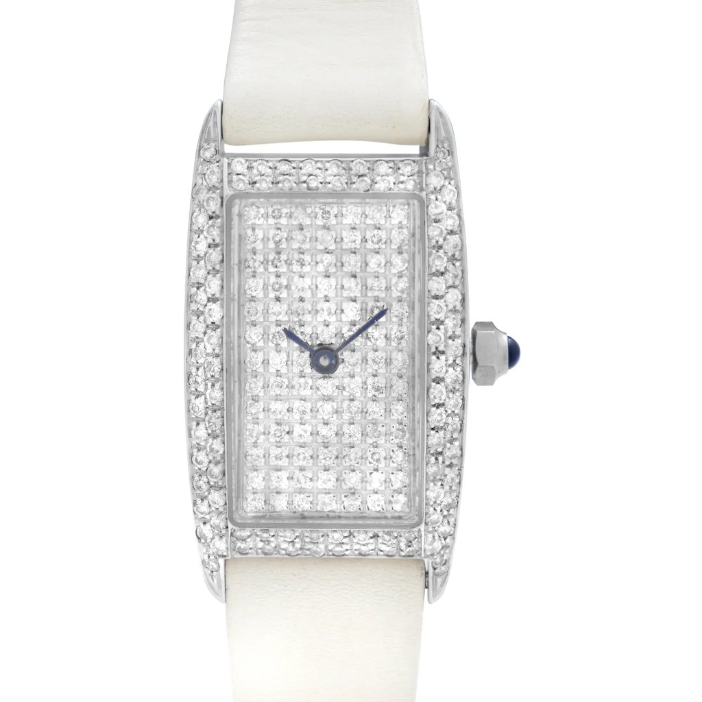 An image of a Wristwatch by Vicence. This Pre Owned item is designed for Women, featuring a Dress/Formal style. It has a Quartz movement and an Analog display with a Diamond dial color. The indices include 12-Hour Dial,No Hour Marks. The band is made of Leather and the case is made of White Gold. The watch has a Rectangle shape with a case size of 19 mm and a case thickness of 7.5 mm.