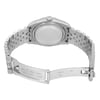 An image of a pre-owned women's Rolex wristwatch, viewed from the back. The watch is positioned horizontally, showcasing the stainless steel bracelet and open clasp. The angle highlights the closed case back and the engraved details on the clasp, with the image taken at a close distance to capture fine details.
