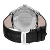 An image of a pre-owned wristwatch viewed from the back, showcasing the closed clasp. The angle is directly from behind, providing a clear view of the watch's polished metal back and engraved details. The black leather strap is visible, with a focus on the clasp, which is engraved with the brand name. The image is taken at a close distance, highlighting the texture of the leather and the sheen of the metal components.