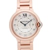 An image of a pre-owned Cartier women's luxury wristwatch in excellent condition. The photo is a front close-up shot capturing the watch face at a direct angle with the camera positioned at a close distance. The watch features a round rose gold case and band, a silver dial with blue hands, and diamond markers at the hours. The Cartier brand name and "AUTOMATIC" text are visible on the dial, along with the "Swiss made" designation at the bottom. The bezel color is also rose gold, and the watch has a 12-hour dial.