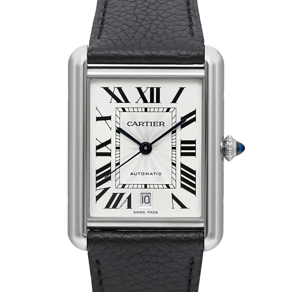 An image of a Cartier men's wristwatch in excellent condition, displayed in a front close-up shot with the watch face centered and angled slightly to the right. The wristwatch features a casual style with a silver dial, gray bezel, and a stainless steel case in a rectangular shape. It has a black leather band, a 12-hour dial, and Roman numerals as indices. The Cartier logo and the word "AUTOMATIC" are visible on the dial, which is situated at a moderate distance allowing for clear visibility of the details. This watch is a display model and may show minor blemishes. 